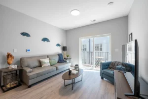 Modern living room with balcony access.