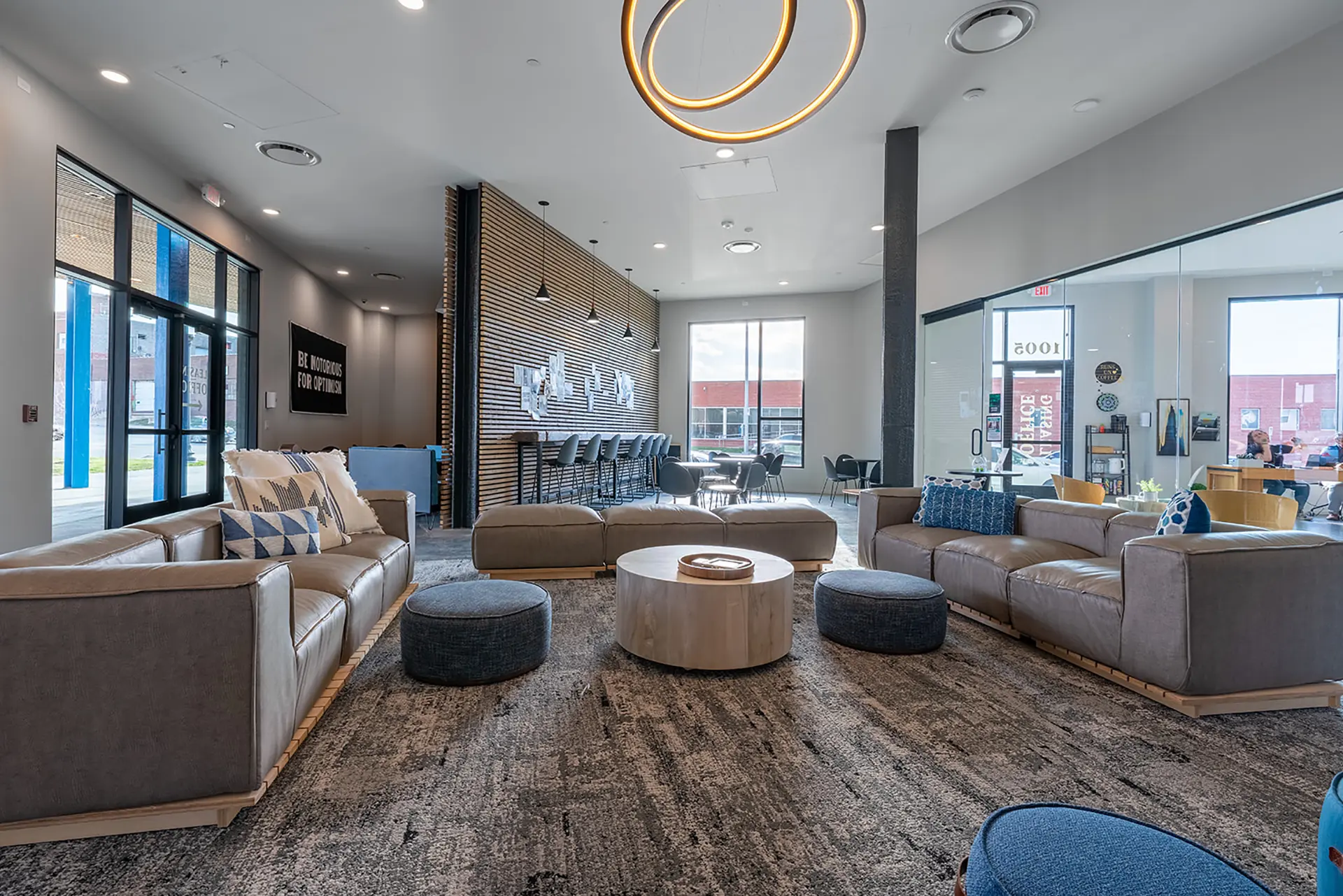 Modern lounge with stylish seating arrangement.