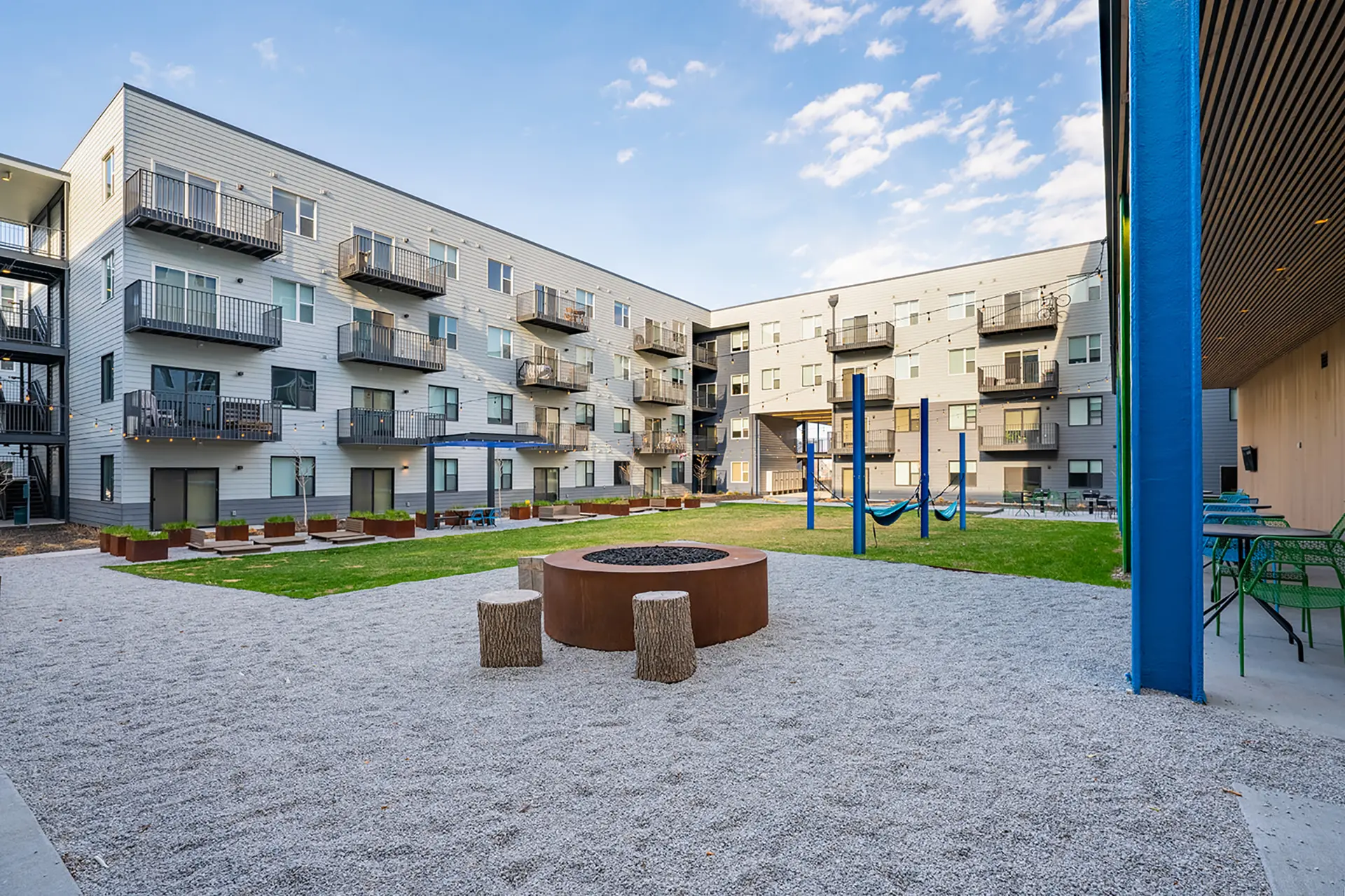 Modern apartment complex with outdoor amenities