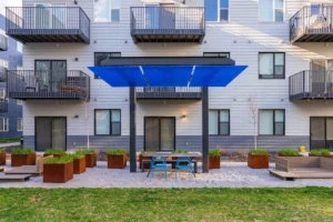 Modern apartment with outdoor seating area.
